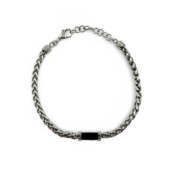 Bracelet Distingué ajustable 20–21,5 cm AJ&Co, finition argentée, avec détail noir et chaîne d’extension.