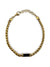 Bracelet Distingué ajustable 20–21,5 cm AJ&Co, finition dorée, avec détail noir et chaîne d’extension.