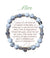Bracelet Earth Angel « Mère » à perles blanches et grises, avec sa présentation en français.