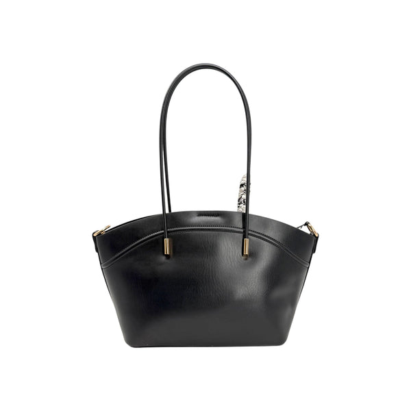 Sac à main noir Maison Taïga avec poignées fines et détails dorés sur fond blanc