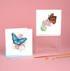 Carte de vœux papillon bleu et fleurs roses en papier roulé