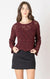 Openwork sweater with wavy hem