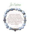 Bracelet Earth Angel « Je t’aime » à perles blanches et grises, avec sa présentation en français.