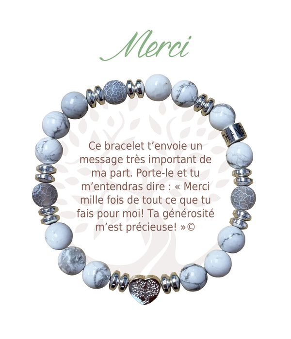 Bracelet Earth Angel « Merci » à perles blanches et grises, avec sa présentation en français.