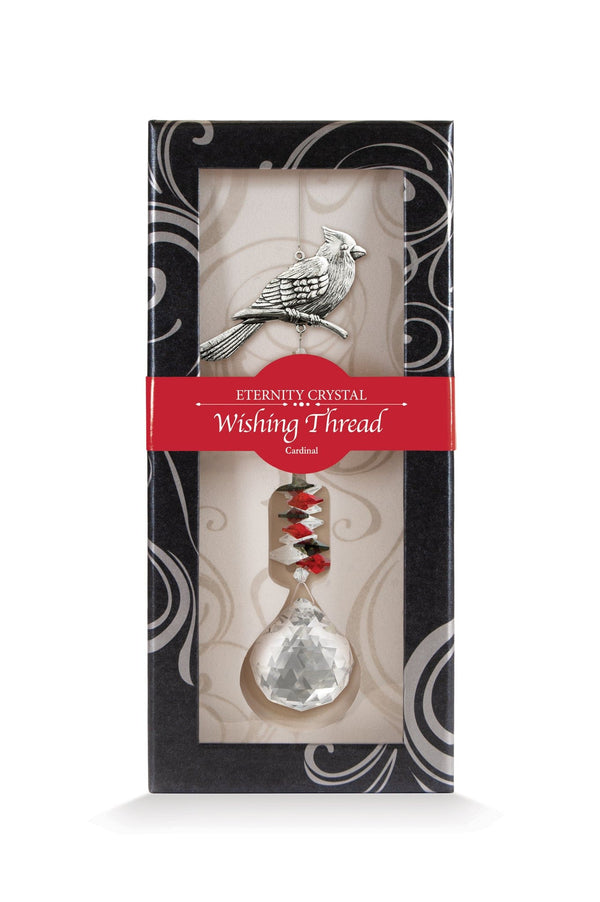 Fil à vœux Cardinal Eternity Crystal présenté dans sa boîte illustrée avec son cristal facetté.