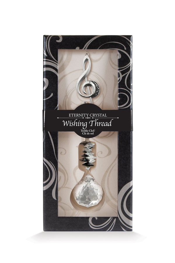 Fil à vœux Clé de sol Eternity Crystal présenté dans sa boîte illustrée avec son cristal facetté.