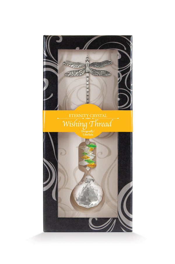 Fil à vœux Libellule Eternity Crystal présenté dans sa boîte illustrée avec son cristal facetté.