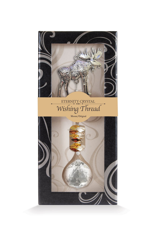 Fil à vœux Orignal Eternity Crystal présenté dans sa boîte illustrée avec son cristal facetté.