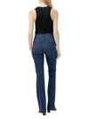 Back view of Maison Taïga Avery curvy fit high-rise bootcut jeans in dark indigo stretch denim on a model.