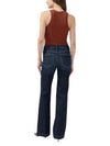 Maison Taïga Avery curvy fit high-rise dark indigo trouser jeans with a flared leg, back view on a model.