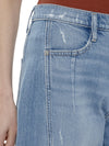 Maison Taïga high-waisted barrel leg jeans in light indigo denim with distressed details and angled side seams