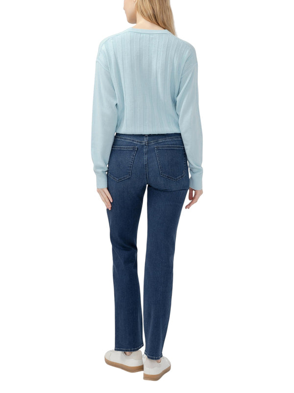 Maison Taïga Silver Jeans Co. Isbister straight leg jeans in dark indigo worn with a light blue ribbed sweater