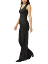 Maison Taïga Silver Jeans Co. Suki wide leg black denim jeans worn by a woman with a black tank top
