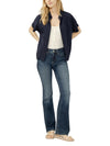 Maison Taïga Silver Jeans Co. Suki mid-rise bootcut jeans in dark indigo Sundown wash on a model
